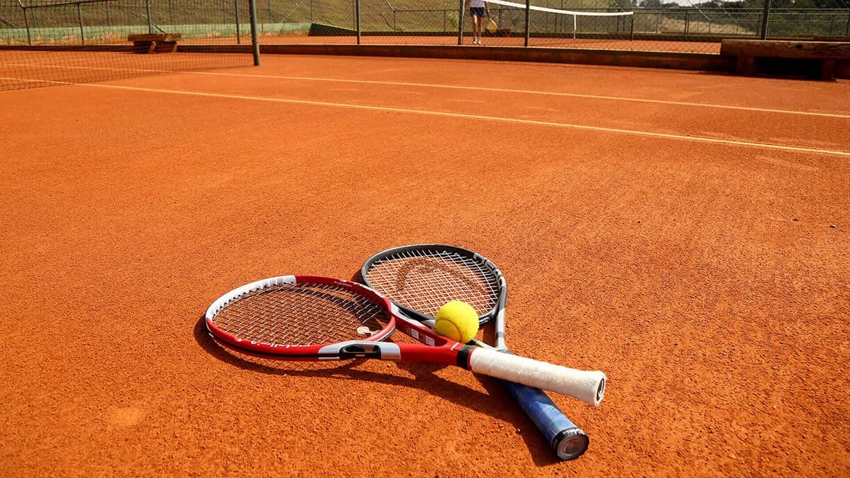 Quadra de tênis - Condomínio Campos de Santo Antônio II